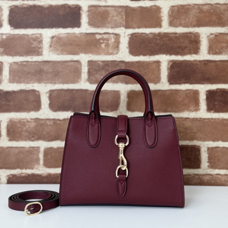 G*u*i top handle bags